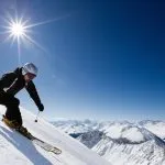 Male skier with mountain view